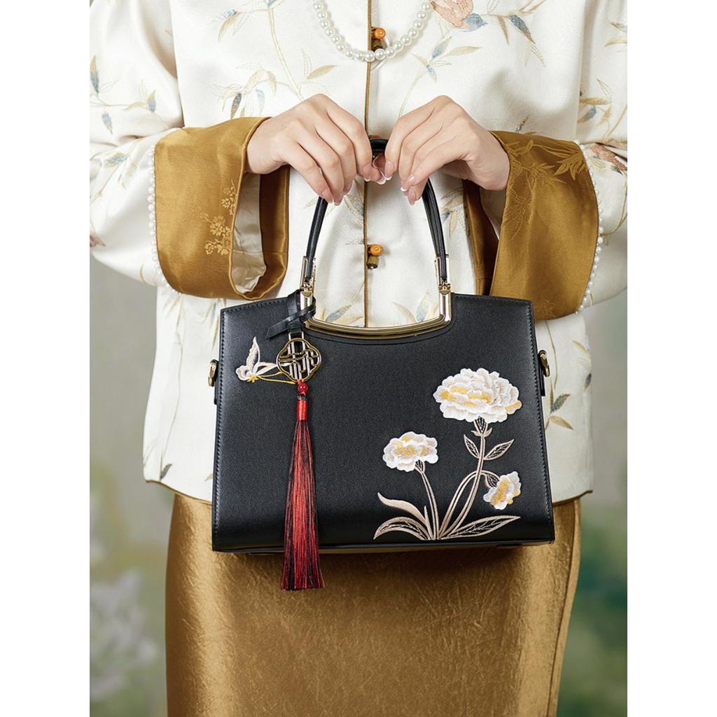 Simple cowhide mini handbag 2026 new summer leather women's messenger bag fashion AL669