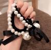 Elegant Black Bow Ponytail Holder with Pearls for Women