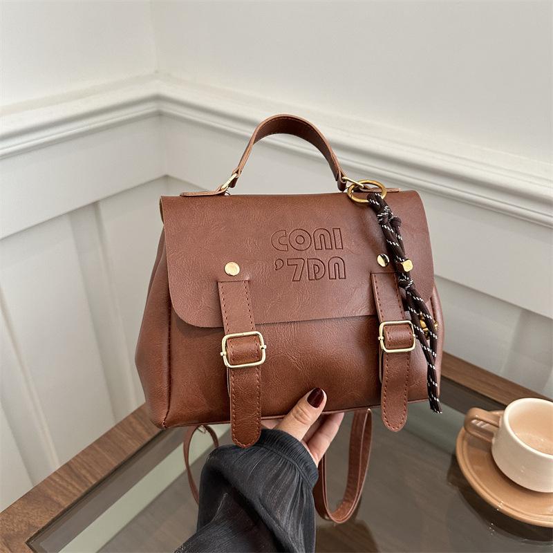 

Сумка-рюкзак женская весна 2025 новая корейская версия трендовый зарубежный стиль нишевый дизайн ретро-сумка рюкзак для поездок на работу Without pendant коричневый