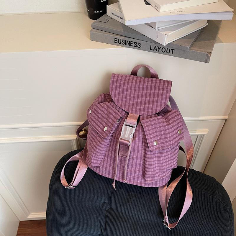 

College style casual portable canvas bag women 2025 new nylon plaid backpack simple student schoolbag фіолетовий