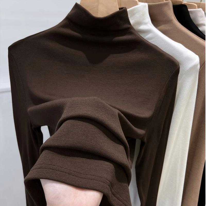 For Autumn and Winter, Women Can Wear A Semi-high-neck Solid-color Base Layer and A Long-sleeved T-shirt Over It for A Slimming Look