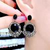 Retro high-end dark black crystal stud earrings 111 silver needle niche design temperament fringed earrings personalized earrings