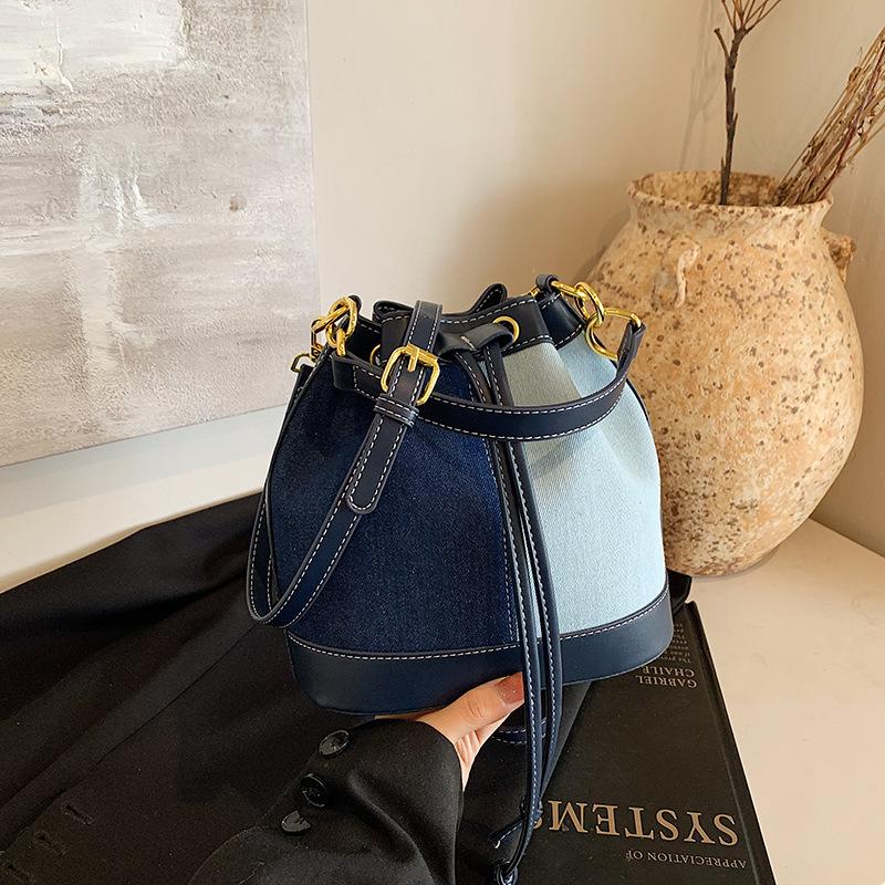 Winter new fashion niche popular contrasting colors pump belt bucket bag versatile portable shoulder women's bag