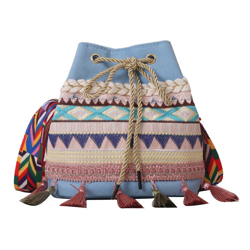 New Korean version ins bucket bag, foreign gas fringed single shoulder oblique span bag, beach ethnic style woven straw bag