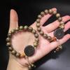Golden Silk Phoebe Wood Bracelet with Ghost Flower Pendant - Unisex Cultural Prayer Beads
