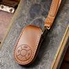 Women's Key Bag Is Suitable for Ola Good Cat Key Cover, Handmade First-layer Cowhide High-end Car Key Cover Chain.