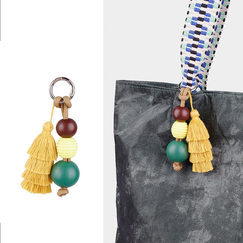 Hochwertiger Taschenanhänger mit niedlichem Ball und Dopamin-Quaste, fester Schlüsselanhänger-Zubehör, vielseitige kreative Mode-Serie