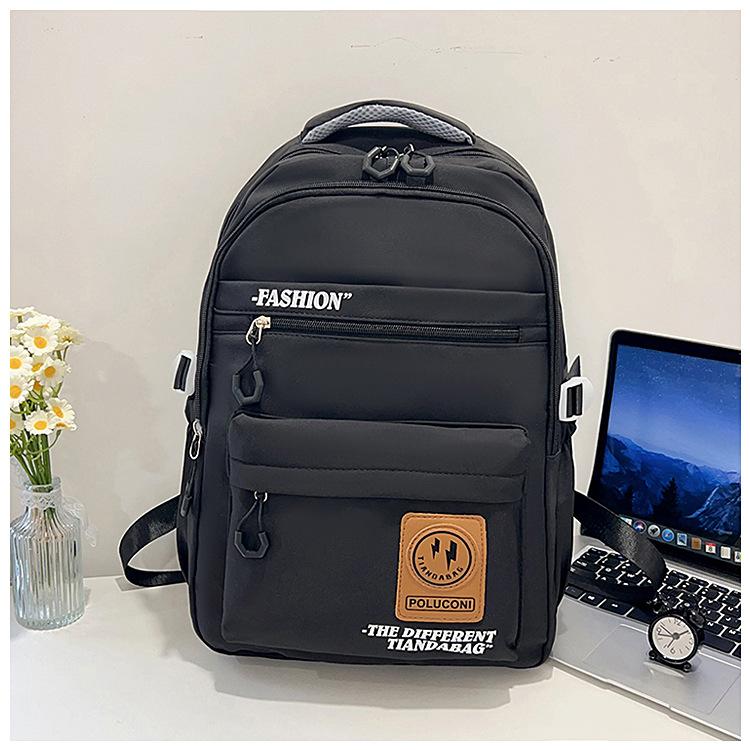 Hot-selling retro tooling wind contrasting color backpack male and female junior high school students versatile tide large-capacity schoolbag