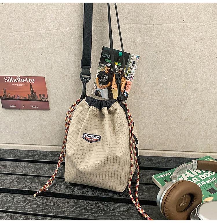 Tide brand messenger bag, men's and women's outdoor sports, girls' drawstring, bundle, color matching, one-shoulder small bucket backpack.