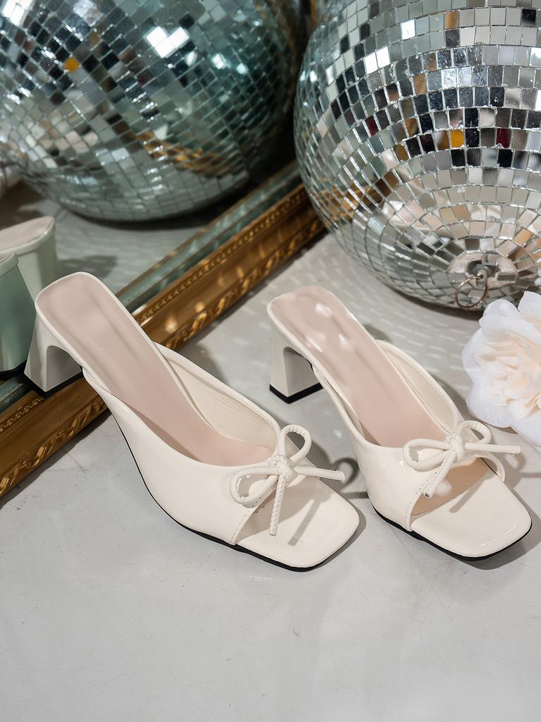 French high-heeled slippers women's 2025 new summer outer wear square head thick heel one-word drag temperament bow cool slippers