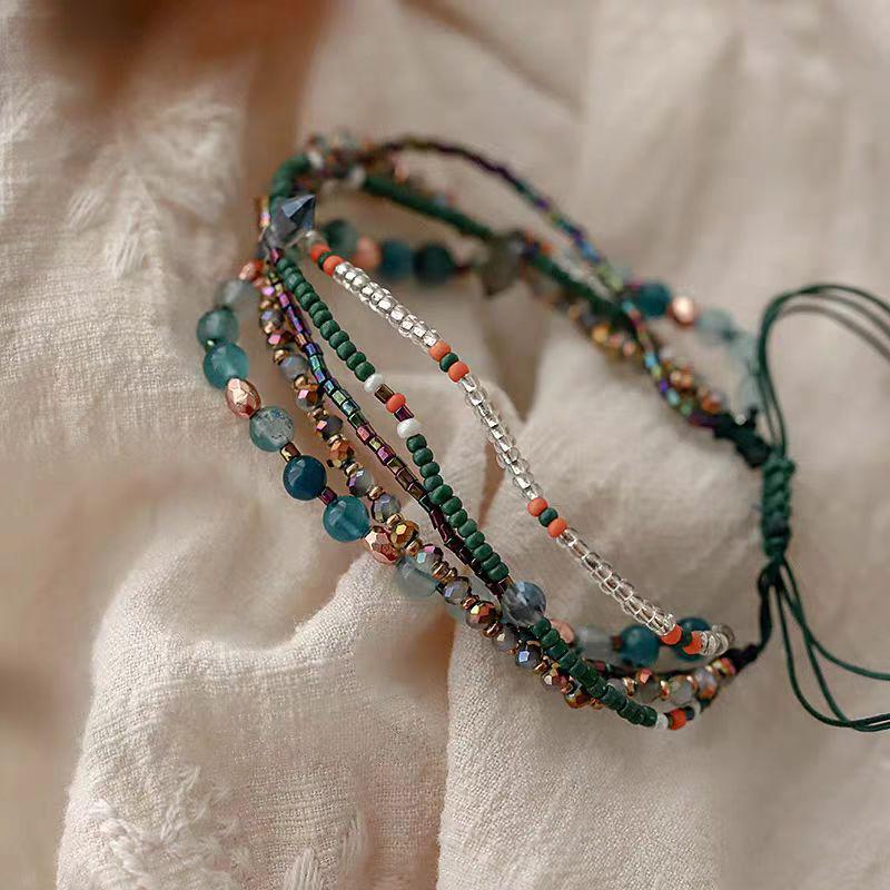 "Women's Multilayer Beaded Bracelet: Elegant Chinese Style, Adjustable Braided Design"