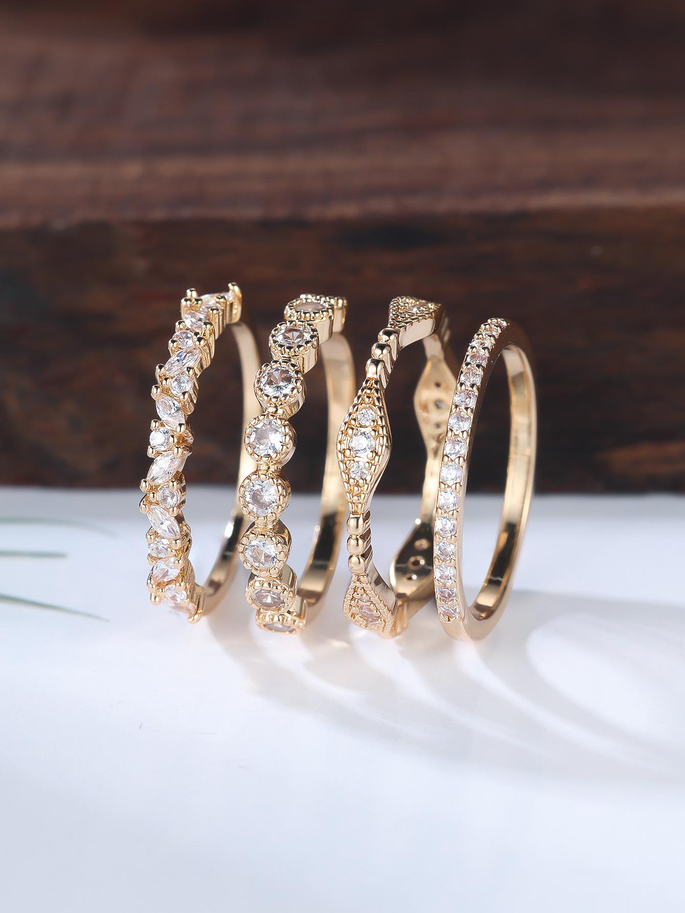 

Hot Sale Gold Round White Diamond Horse Eye Full Ring Four-piece Ring Simple Niche Ring No. 10