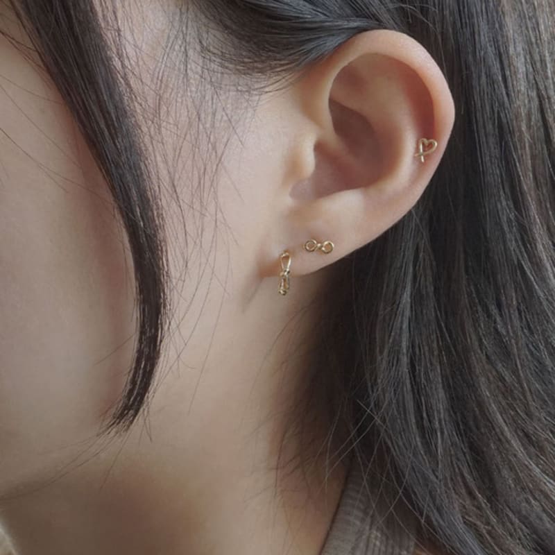 youngglow 14k infinity knot piercing