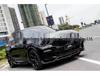 BMW X5 G05 Carbon Fiber Black Warrior Kit: Head Shovel, Front Lip, Side Skirts, Rear Wing, and Corner Spats.