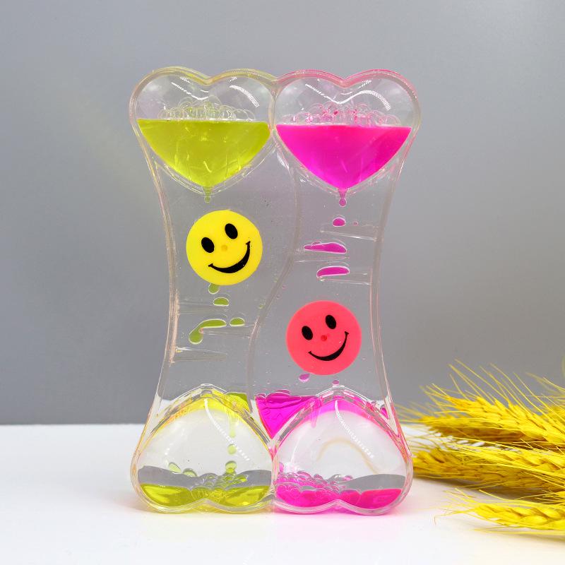 Tofarget oljedråpe timeglass - Dynamisk skrivebordsornament og studentgave
