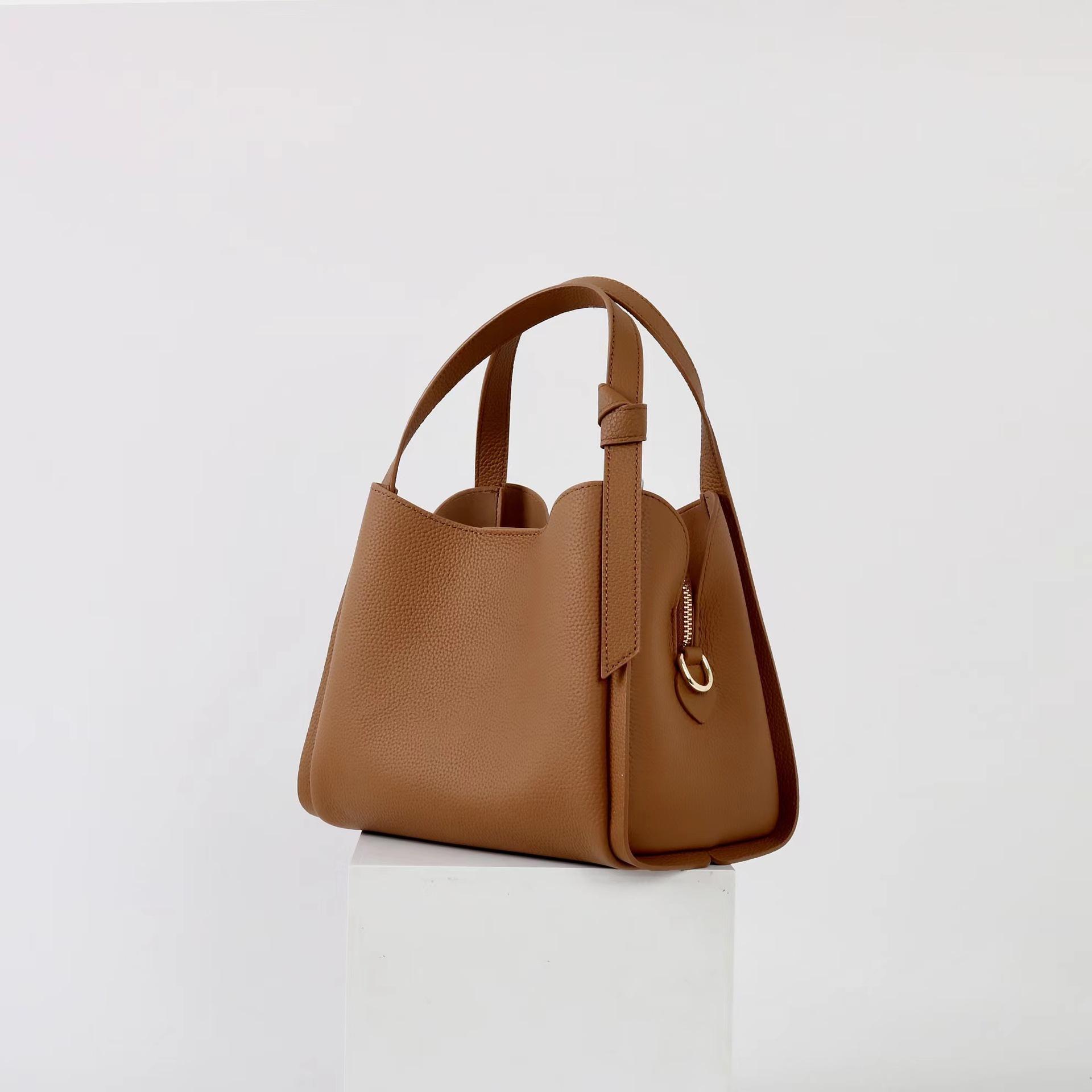 

2025 New Versatile Head Layer Cowhide Bucket Bag With Advanced Trendy Style Large Capacity Commuter Handheld Single Shoulder Crossbody 23cm золотий коричневий колір