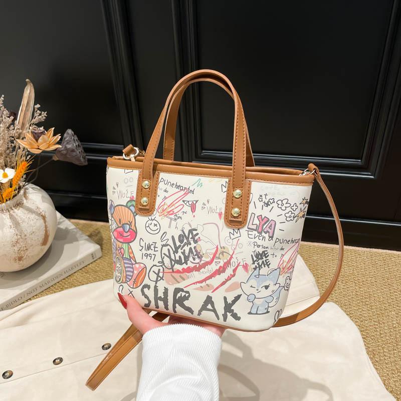 Große Eimer-Tasche aus PU für Damen mit Cartoon-Graffiti-Design, lässiger Streetstyle