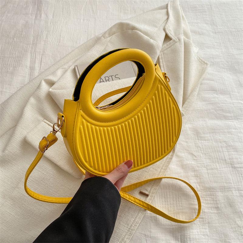 Solid color handbag women's 2025 early new fashion casual messenger bag portable small bag