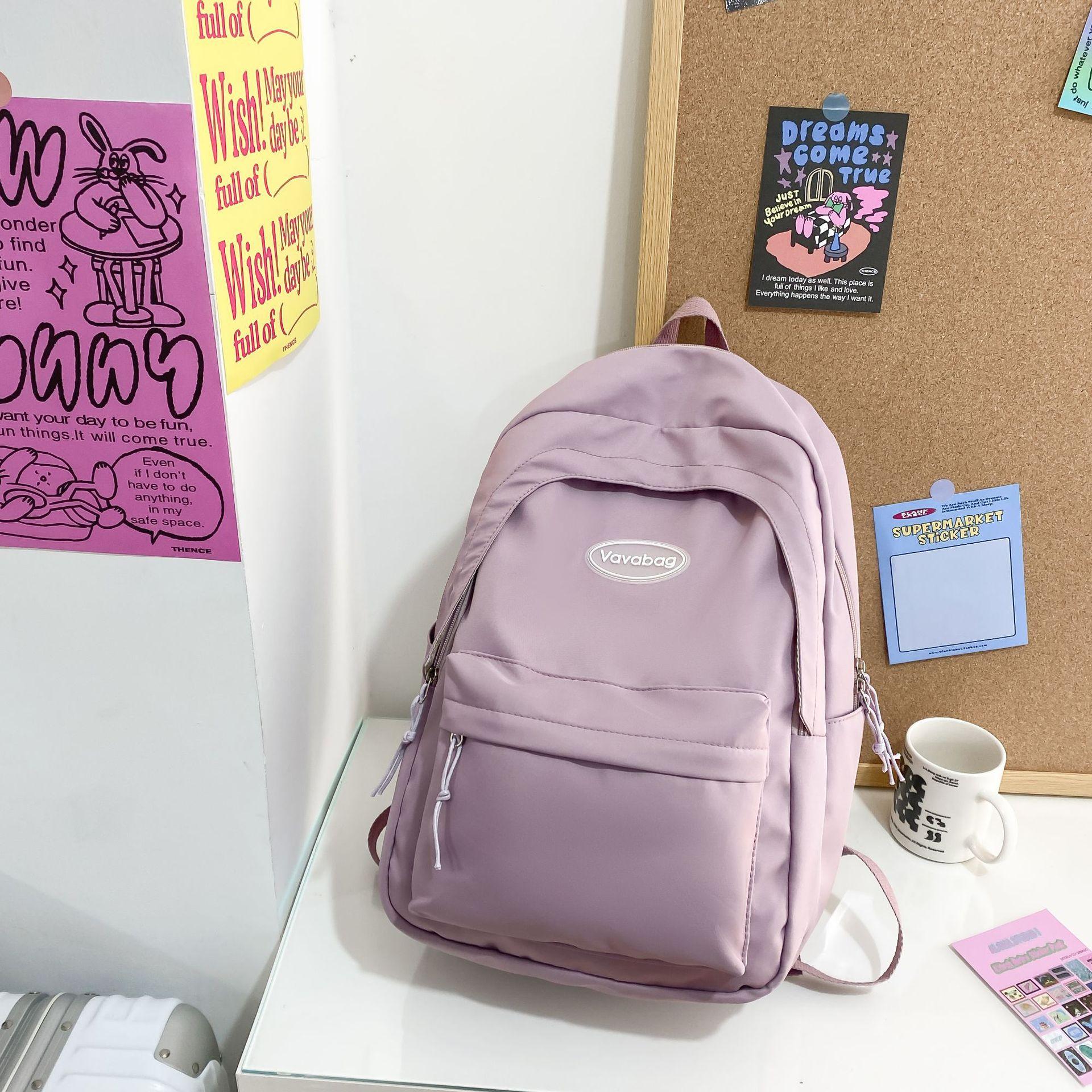 

Корейская версия ins girl campus simple сплошной цвет рюкзак для учеников младших классов средней школы женский рюкзак большой емкости фиолетовый