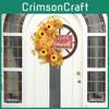 Festive Thanksgiving Wreath Designed With Vibrant Maple Leaves And Cheerful Sunflowers For Home Entry