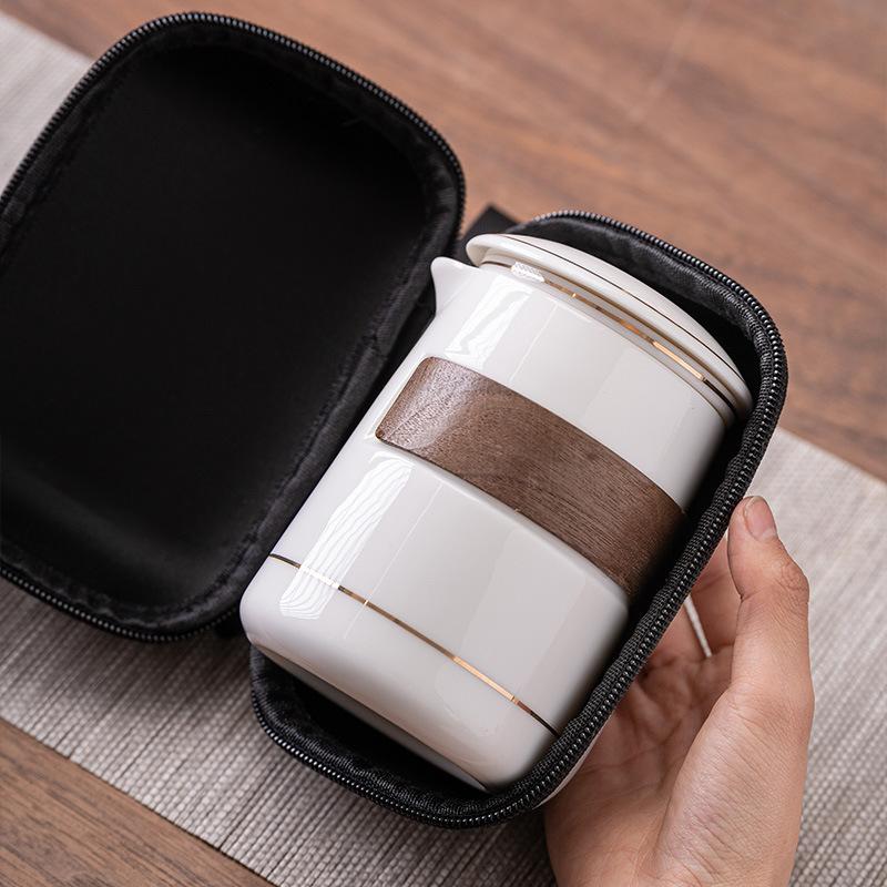 Suet jade white porcelain travel tea set portable storage bag high-end one pot three cups corporate business gifts