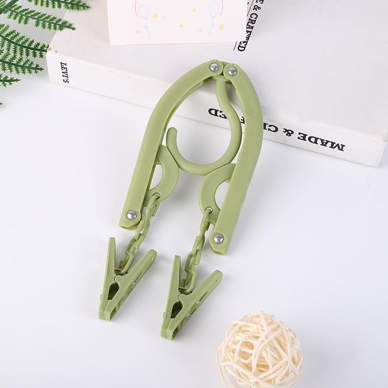 Multifunctional Non-Slip Folding Clothes Hanger & Drying Rack for Travel, Dormitory, or Hotel.