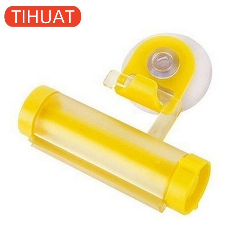 Plastic Device - A Suction Cup Press for Convenient Storage and Uniform Squeezing of Toothpaste Tubes