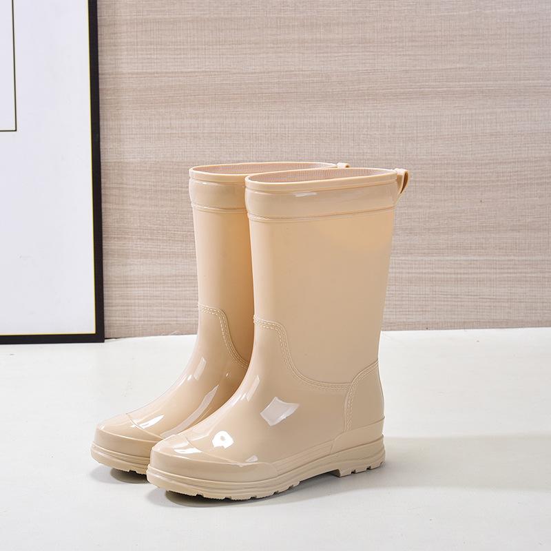 Women's Waterproof Thick-Soled Mid-Calf Rain Boots - Non-Slip, Wear-Resistant, Warm Rubber Shoes for Work and Wading.