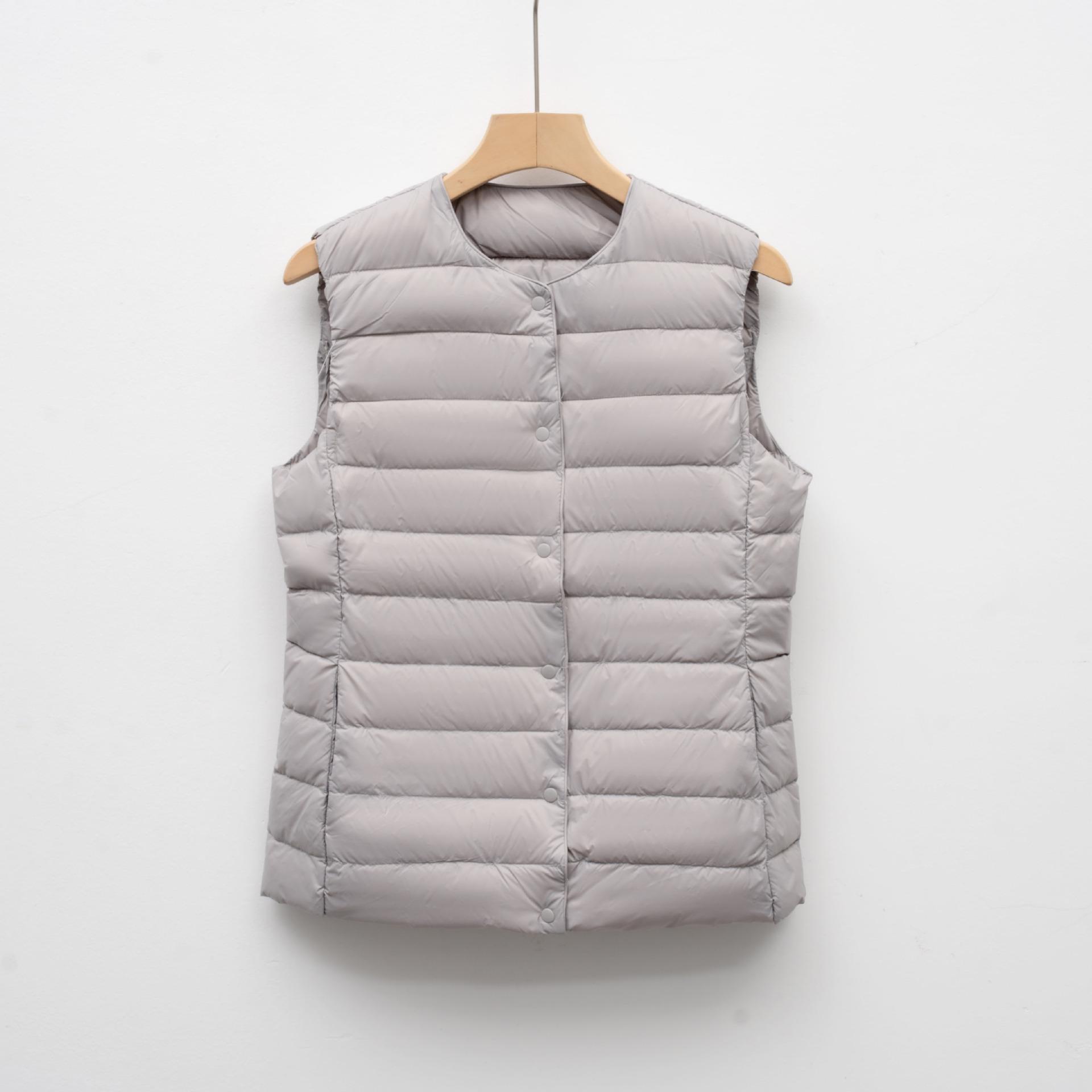 

Жіночий легкий пуховий жилет - Без рукавів, Короткий, Круглий виріз, Ідеальний для осені та зими Extra Large