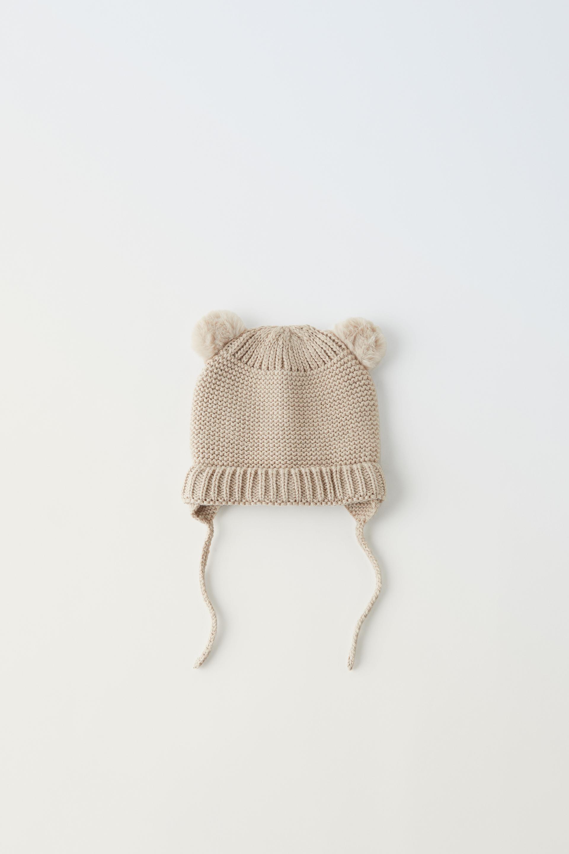 

ТРИКОТАЖНАЯ ШАПКА С ПОМПОМОМ