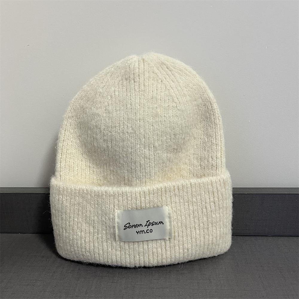 Kleiner Standard-Wollhut Damen warm schlicht retro Herbst und Winter kältefest Schlupfmütze modifiziert die Gesichtsform und zeigt ein kleines Gesicht