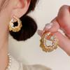 French Fashion Retro Design with Rhinestones Studded Metal Irregular Temperament Light Luxury Cool Style Earrings for Women.