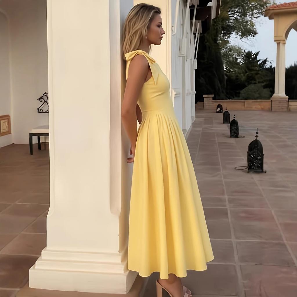 Bow suspender yellow dress women's waist tailoring with large pendulum version, small person looks tall