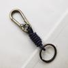Retro Alloy Cowhide Keychain with Hand-Woven Belt - Men's Business Gift Key Ring for Car and Mountaineering Enthusiasts