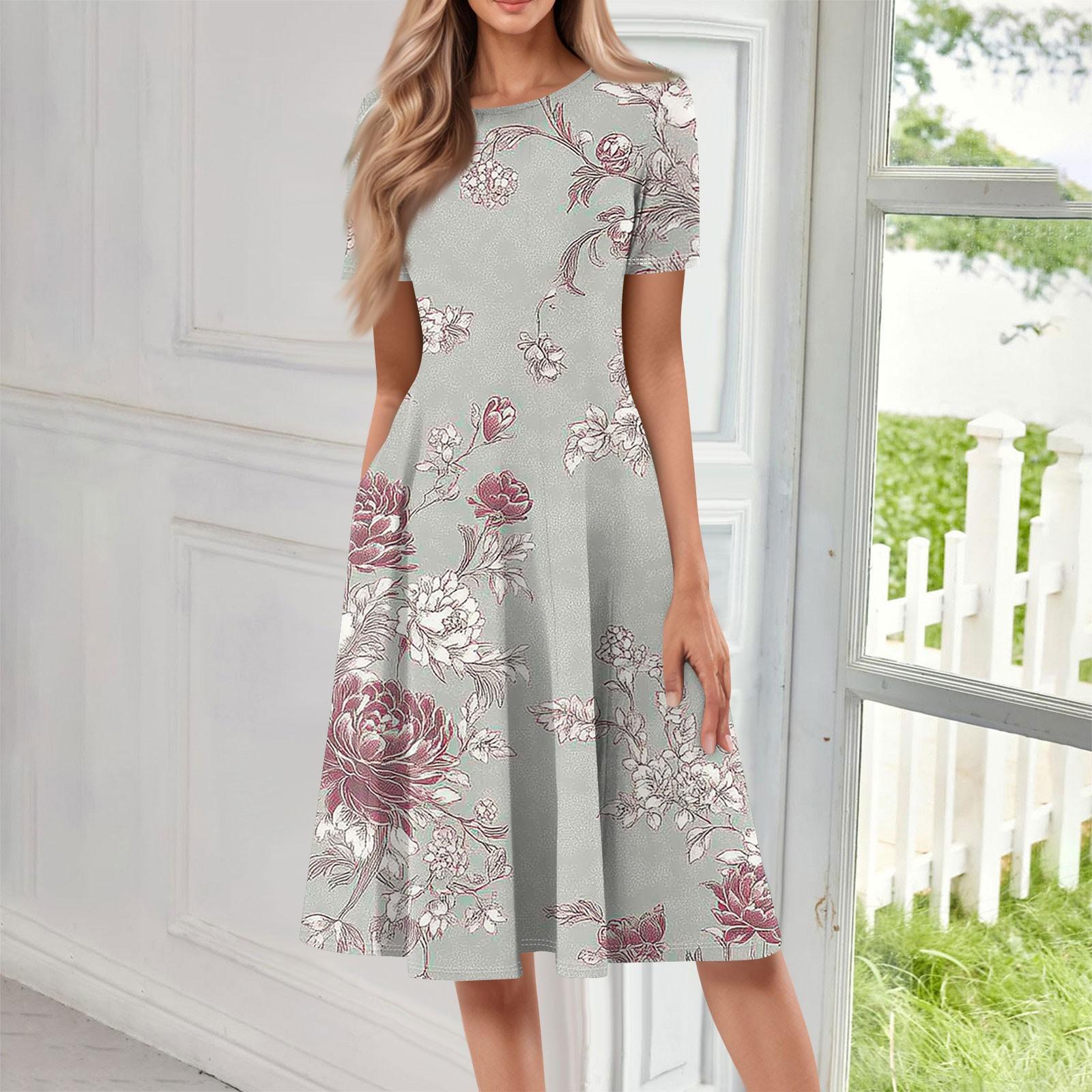 

Женское свободное повседневное и модное платье с круглым вырезом и короткими рукавами, средней длины с принтом M