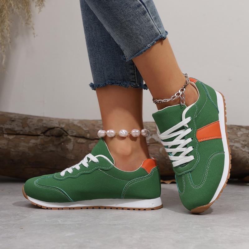 Autumn and winter new large size fashion casual temperament flat bottom lace-up color matching outside casual shoes women