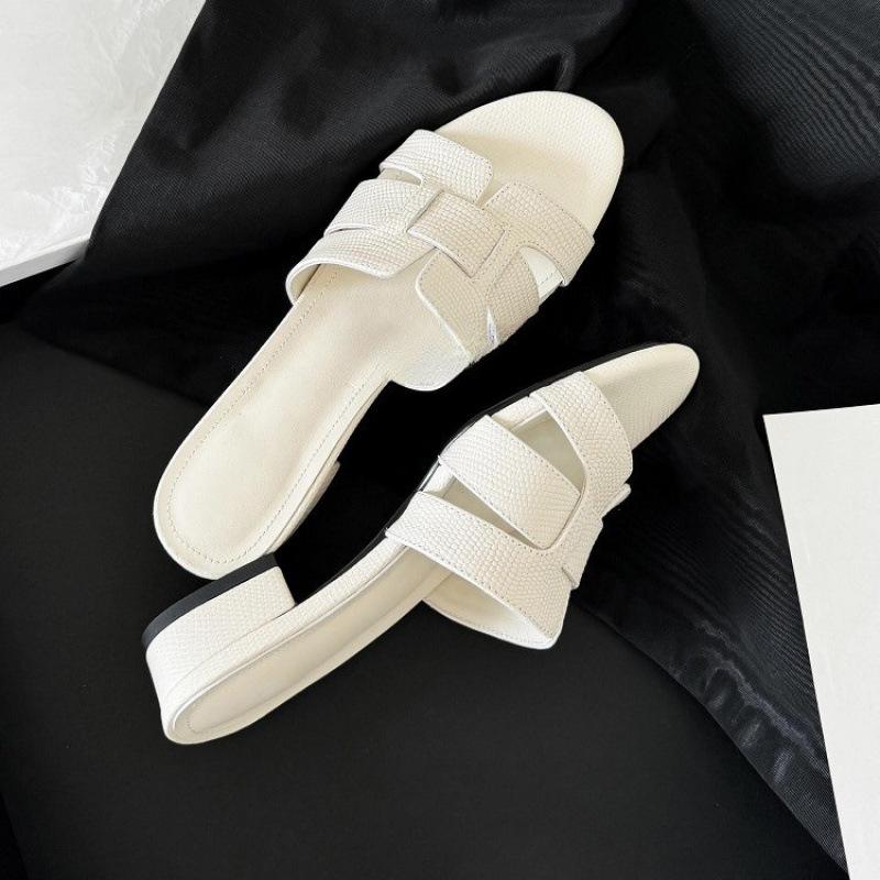 

Temperament versatile one-word drag thick heel outer wear wear versatile casual soft leather woven vacation beach cool slippers women s summer 35 чёрный