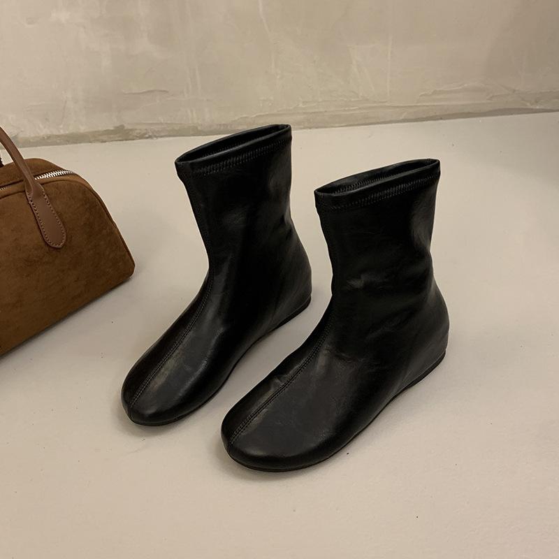 Medium leather boots flat bottom round head elastic winter new super soft thin boots inner height increase high boots look thin