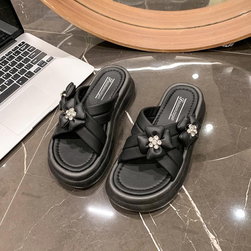 

Маффиновые толстоподошвенные крутые тапочки для женщин, летние новые модные тапочки с перекрестными ремешками для женщин 40 чёрный