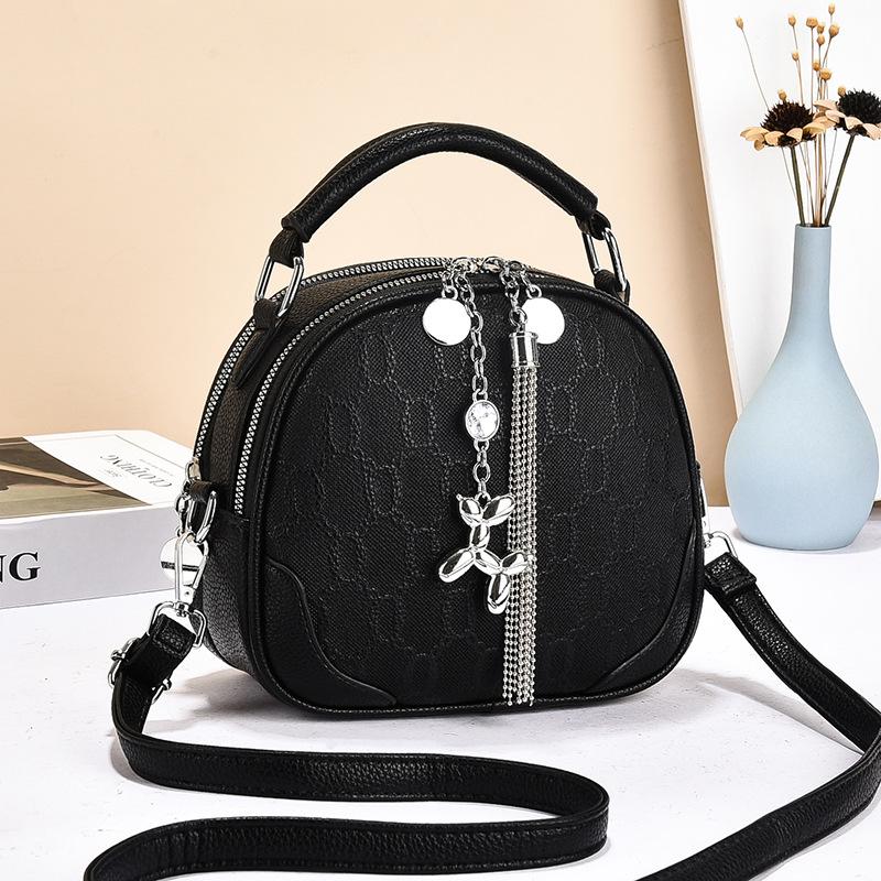 

Simple and fashionable single shoulder portable messenger bag autumn and winter exquisite small round bag women s multi-layer fringed bag чёрный