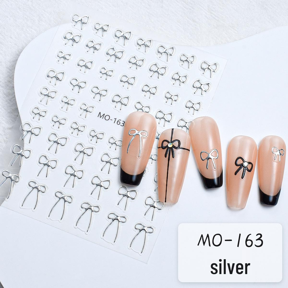 

Хрустальные наклейки для ногтей с бантиками: Минималистичные наклейки в виде ромбовидных линий черного, белого и красного цветов.