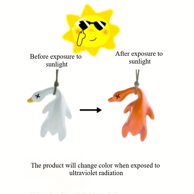 UV-reaktiv anka berlock magisk färgskiftande nyckelring bilprydnad