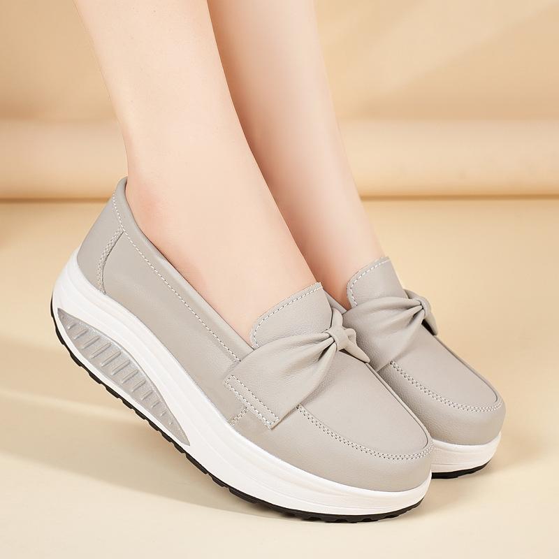 Scarpe comode taglia grande nuove scarpe da ginnastica bianche scarpe da infermiera zeppa con suola spessa suola morbida scarpe muffin scarpe singole