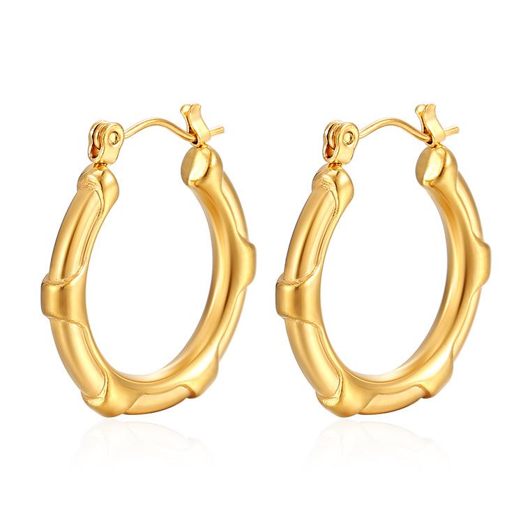 Boucles d'oreilles rondes polyvalentes rétro premium en acier inoxydable design de niche tempérament simple pour femmes