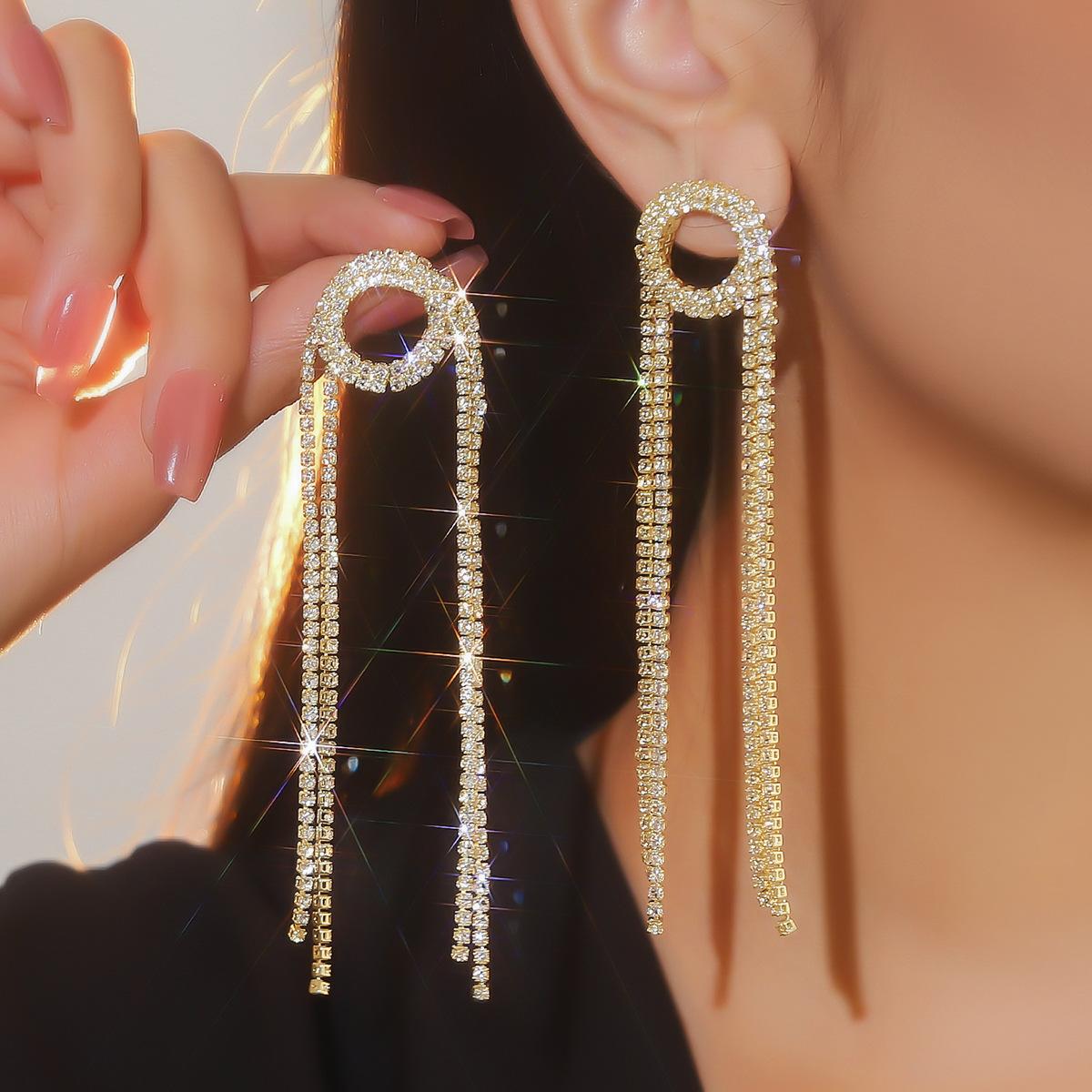 

Stylish round hollow long fringed earrings