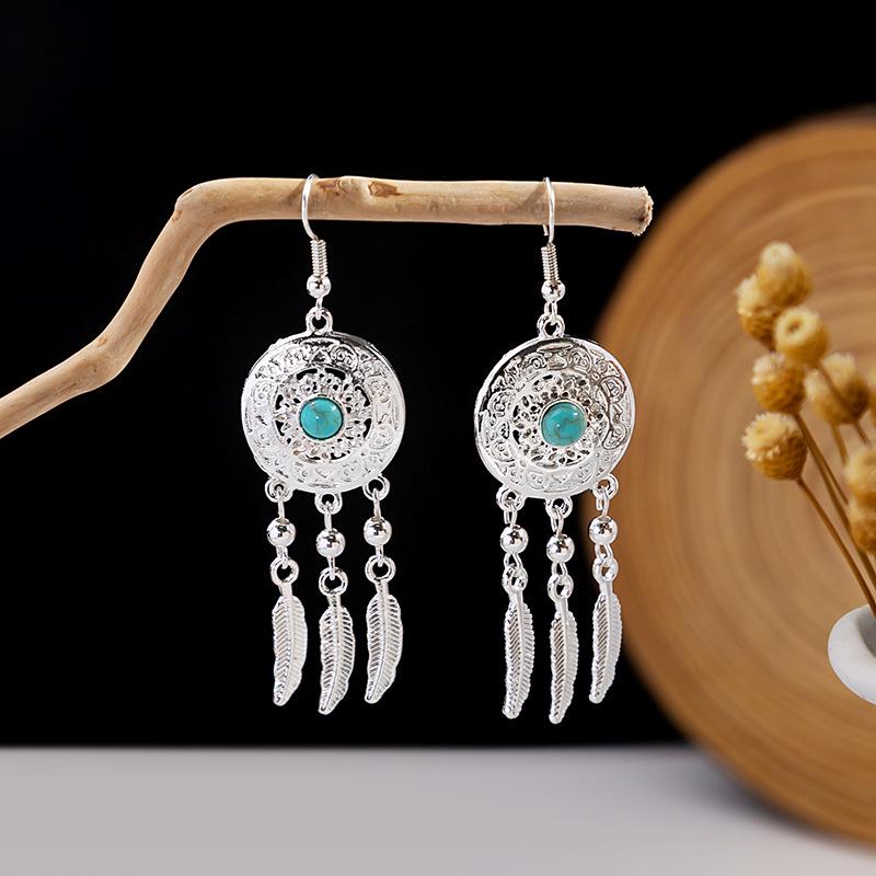 Boucles d'oreilles pendantes à pompons de plumes ethniques - Style argent Miao imitation, article touristique populaire, design mignon de haricot.