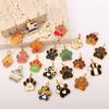 2 Stück Cartoon DIY Edelstahl Tropfen Hundepfotenabdruck Anhänger Handgefertigtes Accessoire Schmuck Vergoldeter Charm Großhandel