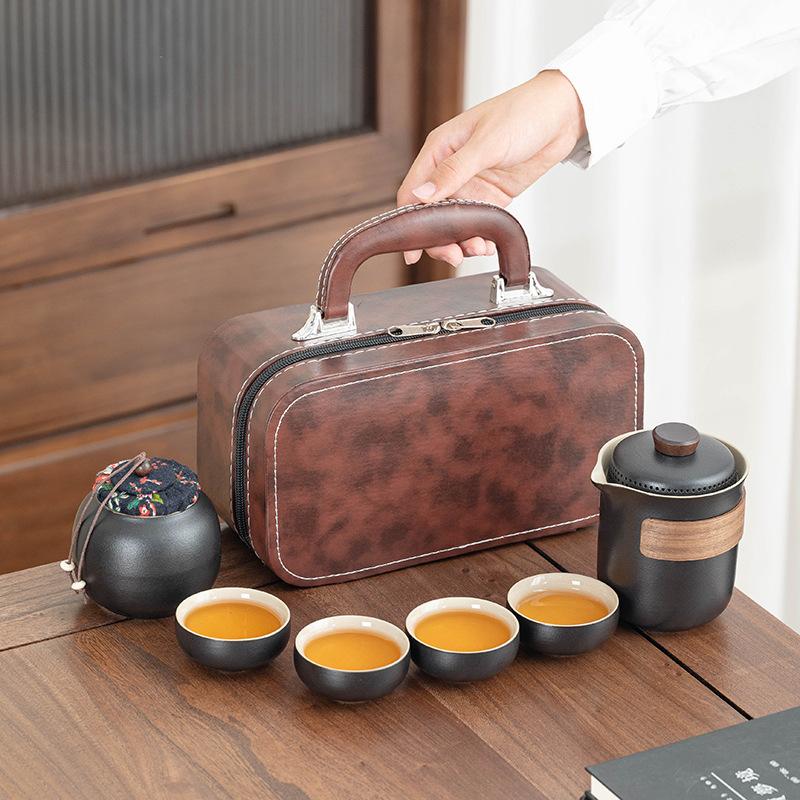 

Simple coarse pottery Lingxue tea set outdoor business travel portable high-end leather bag business travel teapot set