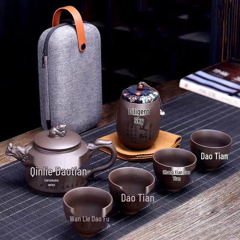 Zisha Travel Tea Set: Portable Xishi Pot with Quick-Brew Cup and Four Cups - Perfect for Outdoor or Home Tea Ceremonies.