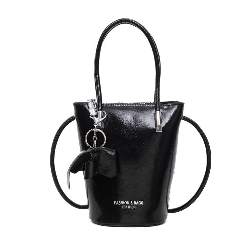 

Женская модная сумка-ведро кроссбоди 2025 - Нишевый дизайн, Популярная маленькая сумка для помады чёрный